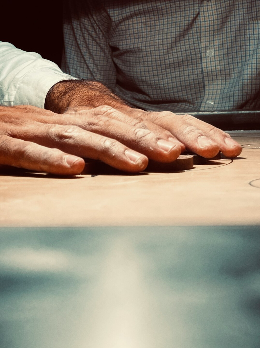 Architect reviewing blueprints on a drafting table
