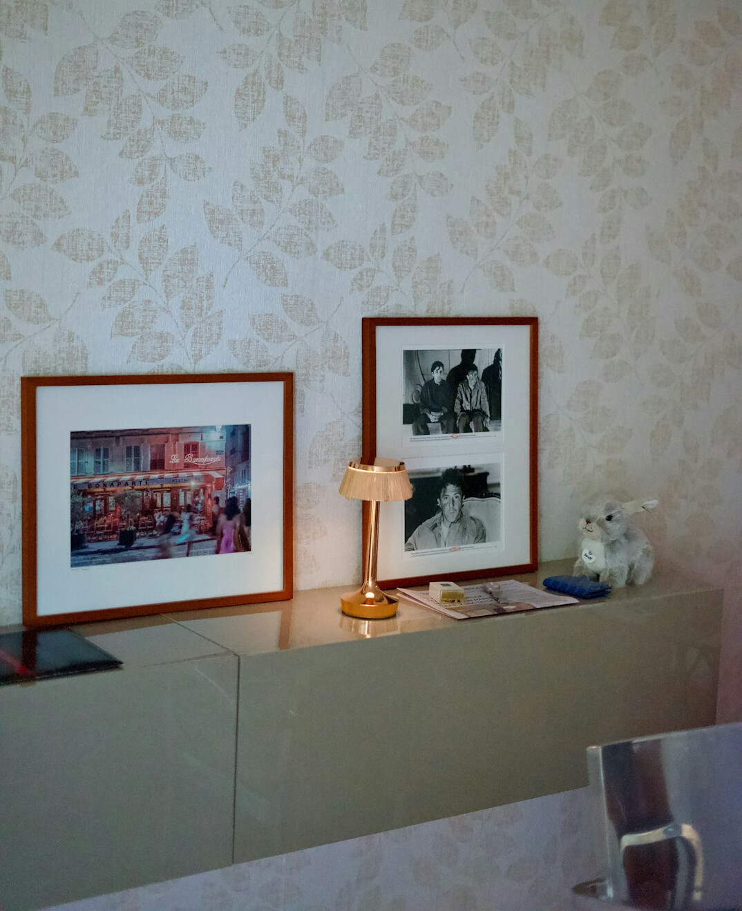 Living room corner with a gallery wall of framed art
