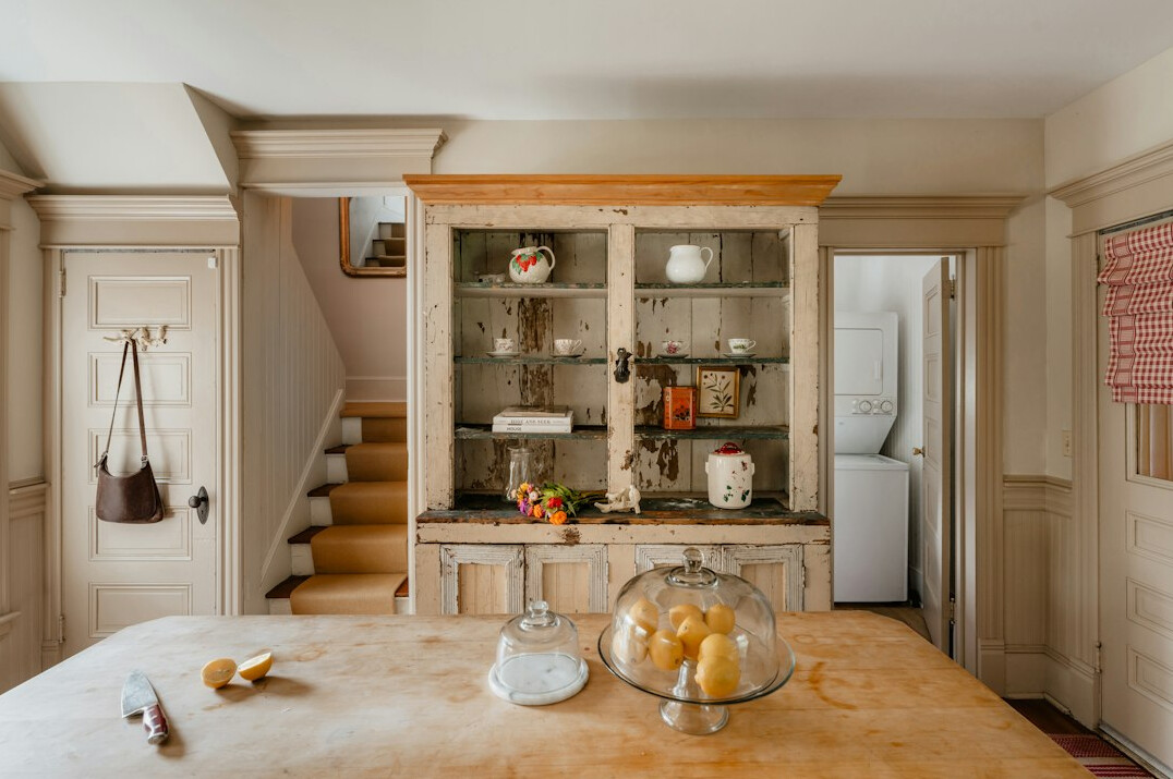 Farmhouse-style kitchen with open wooden shelves